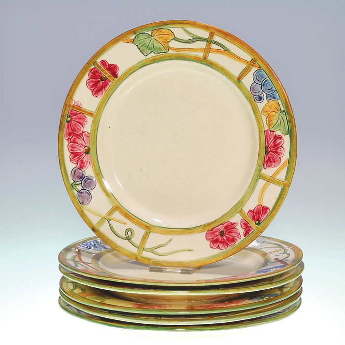 Set of 6 Weller plates, floral borders, 8 7/8": Weller set of 6 Zona Dinnerware 8 7/8 inch plates with decorative borders. Each is impressed Weller in block letters and has a notation in slip. There is fine crazing and two of the plates have a smal