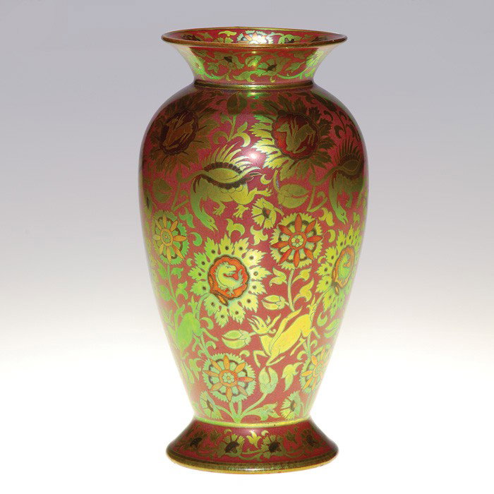 Decorated Zsolnay vase, dragons, flowers, deer.: Decorated Zsolnay vase replete with flowers, dragons and winged beasts in many colors. Marked with the "Zsolnay Pecs Made in Hungary" ink stamp logo. Height 8 1/8 inches. Uncrazed and in excellent ori
