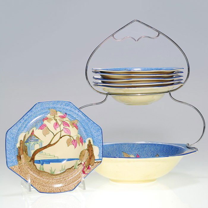 Clarice Cliff "Blue Japan" dessert set: Clarice Cliff Bizarre "Blue Japan" dessert set consisting of large bowl, six smaller bowls and metal frame. Each piece is ink stamped "Hand Painted Bizarre by Clarice Cliff Wilkinson Ltd. England." an