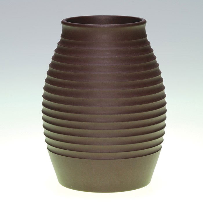 Wedgwood Keith Murray vase, Bronzed Black Basalt: Keith Murray for Wedgwood vase done in Bronzed Black Bassalt glaze. The vase is horizontally ribbed. Bears the ink stamp "Keith Murray Wedgwood Made in England" logo and is also impressed "Wedgwood Ma