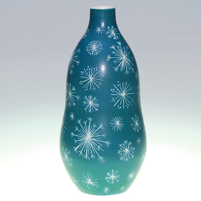 Rorstrand stoneware vase, snowflakes, 10 1/4": Handsome Rorstrand stoneware vase with many snowflakes in white against a medium green ground. Marked in black slip with the Rorstrand logo and also signed "Sverige Kemp. HB." Height 10 1/4 inches. Un