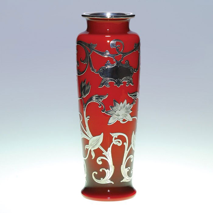Red cased vase, silver overlay, Webb & Sons attrib: Silver overlay and cased vase, attributed to Thomas Webb and Sons. The 10 inch vessel has a white interior with a nice cinnamon exterior and with an overlay of sterling silver of scrolling vines, foli