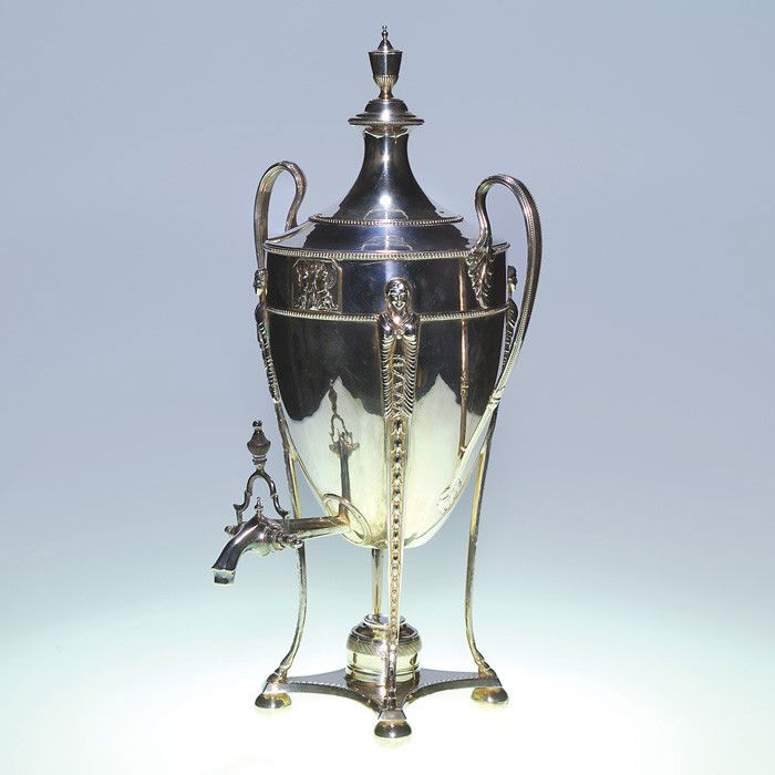Silver plated Hot Water Urn, 22", marked 970: Georgian-style silver plated coffee urn. Four maidens draped in capes adorn the sides terminating into hoofed supports. Decorative beading. The removable burner cup and a ball foot is impressed 970. H