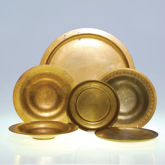 6 Tiffany Studios gold dore' trays, largest 14": Assortment of six Tiffany dore trays. All impressed "Tiffany Studios, New York" except the 14 inch tray that is marked "Tiffany & Co, Makers Bronze. Pattern numbers of the smaller trays, measuring 7 i