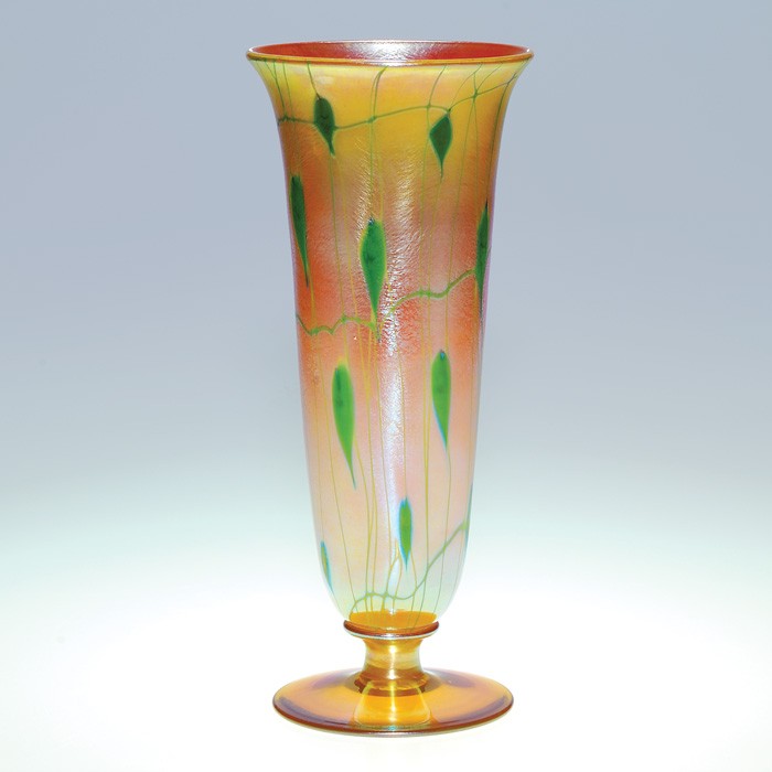 V. Durand vase, vines on marigold, 12", signed: Tall Victor Durand vase, the luster gold surface wrapped with emerald green vines and cascading tendrils bearing lots of foliage scattered throughout. Height 12 inches. The reflective ambergris base b