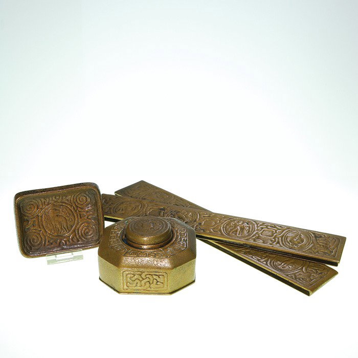 Tiffany Zodiac 3 piece desk set, blotters, tray: Tiffany Zodiac three piece gold dore desk set consisting a 2 by 4 inch wide inkwell, a 3/8 by 3 7/8 inch tray and a pair of 12 inch blotter ends. All marked with the Tiffany Studios, New York impressi