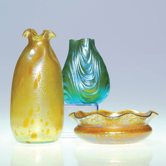 3 Loetz: Oceanik vase; Astraa vase; Czech bowl: Three Loetz items. 1). A 7 inch "Astraa" pattern vase in gold. 2). A 4 1/4 inch "Oceanik" vase in blue with pinched sides. 3). A tri-fold rim and a 1 7/8 inch by 5 1/2 inch ruffled bowl with "oil spot