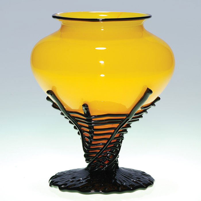 Loetz Tango vase, spider web base, 7 1/4": Attractive Loetz Tango vase, a bright sunny yellow nestled and fused within a black spiders web situated over a tree bark base. Height 7 1/4 inches. Attribution to Michael Powolny. Stamped "Czecho-Slo