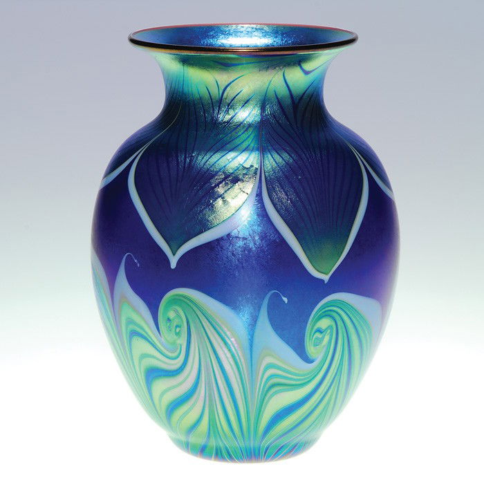 Orient & Flume vase, double pull foliage, cobalt: Beautiful Orient & Flume vase contrived in 1979, having iridescent blue foliage wrapping the shoulder and curled foliage pulled from the base within the cobalt glass. Height 7 1/4 inches. The company