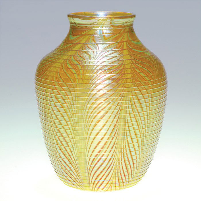 Orient & Flume vase, amber, feathers, threads, 8": Orient & Flume vase attractively decorated with coral and pale green feathers stretched over the yellow glass then caressed with uniform threading. Height 8 inches. The firm's engraved signature along