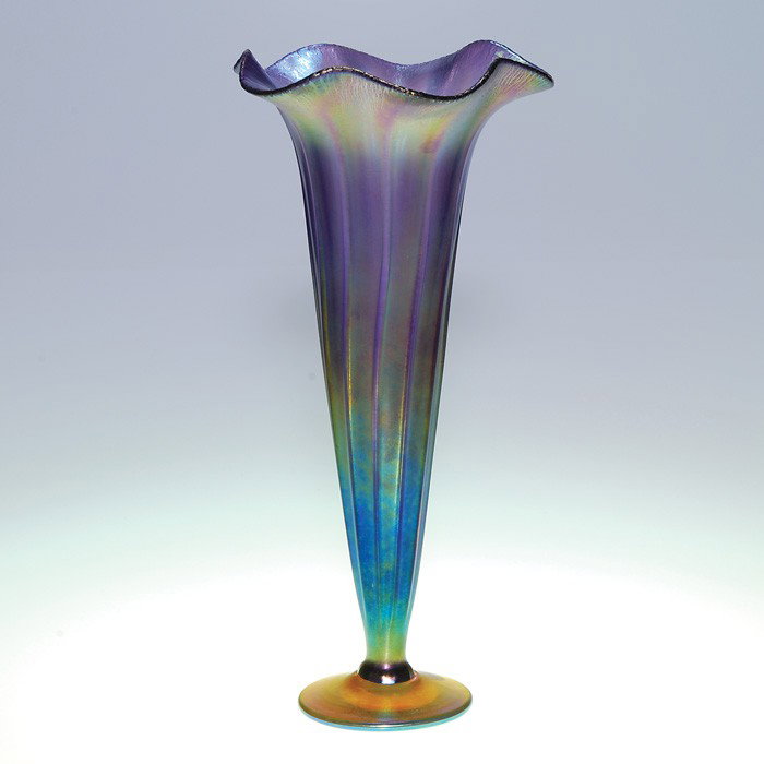 Lundberg trumpet vase, lilac, ribbed, 13 1/2", sig: Tall Lundberg trumpet vase in lilac beautifully ribbed on the side and having a ruffled rim with a stretched border. Height 13 1/2 inches. The base displays a bright halo on the top and is engraved "L