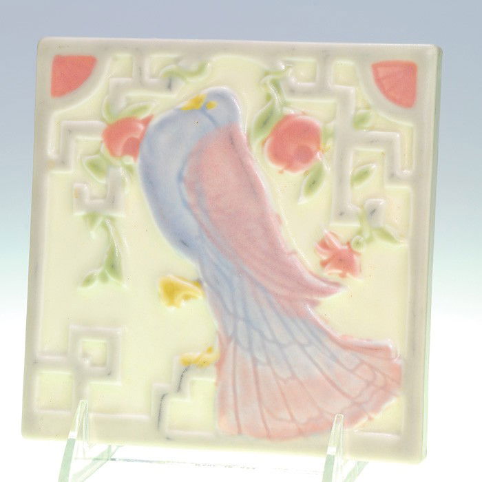 Rookwood "Pigeon" trivet in original Rookwood box: Tea tile with a pigeon made at Rookwood in 1928. Impressed with the Pottery logo, the date and shape 3124. Without crazing and very clean. Comes with original box. Size of tile is 5 3/4 inches square.