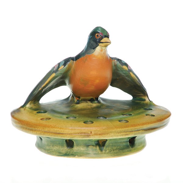 Unusual Weller Muskota 5” X 6 1/4” “Robin” frog: Weller Muskota flower arranger graced by an almost life sized robin with wings spread atop the holder. Impressed Weller in block letters. In excellent, original condition. Scarce and attractive. Size 