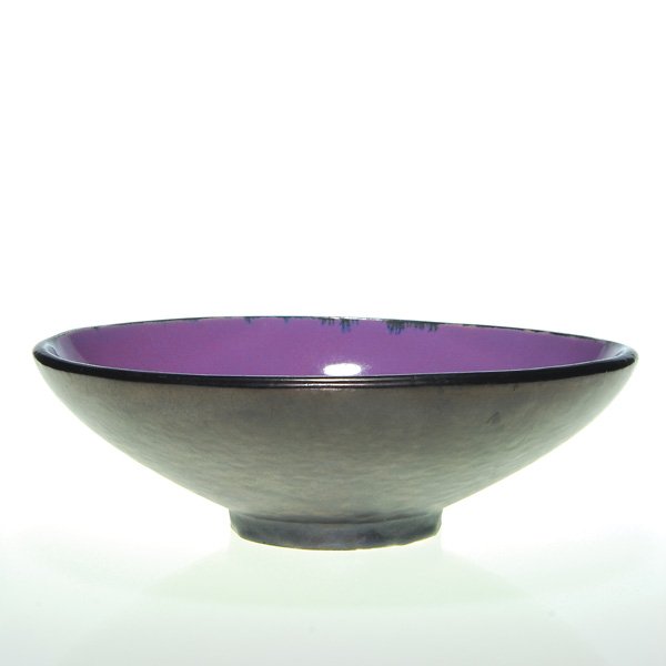 Fulper bowl, Mirrored Black, mulberry flambe': Fulper bowl with a mat Mirrored Black exterior lined with an unusual mulberry flambe’ interior. Unmarked. In excellent, original condition with a few small glaze bubbles in the bowl. Size is 3 1/2 i