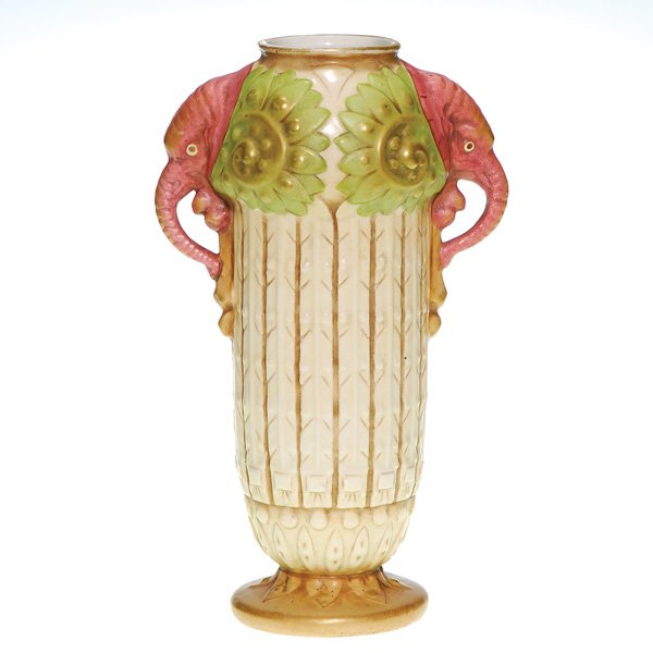 Amphora “Elephant Head” vase, 10 1/2”: Amphora vase with elephant heads serving as handles and having a quartet of stylized trees rising from the base. Impressed with the crown logo, the names Amphora and Austria and the numbers 15013 and