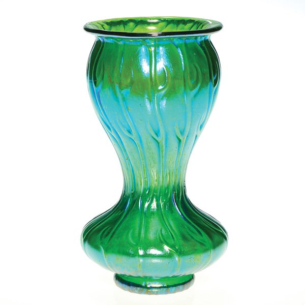 Loetz vase, Neptun Creta Silberiris, 7”: Shapely Loetz vase displaying the Creta Silberiris Neptun pattern and rising 7 inches above a squat foot. The attractive blue color reflects a golden glow nearest the contour. Beautiful vessel in perf