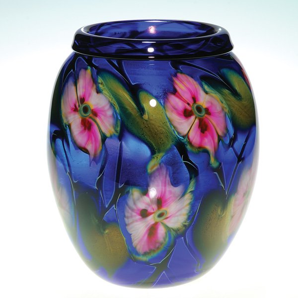 C. Lotton vase, Multi Flora, cobalt blue, 10": Good size Charles Lotton vase upon which he arranged pink and white “Multi Flora” flowers, several variegated leaves and black vines and floating them within a nice bath of cobalt blue. The rim bo
