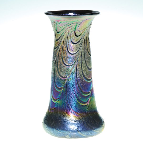 Herb Thomas vase, rainbow silver, drape, 9 1/4": This luminous and heavily iridized pulled drape vase was created by National award winning artist Herb Thomas of Thomas Glass. Unsigned but purchased directly from the artist. Height 9 1/4 inches.