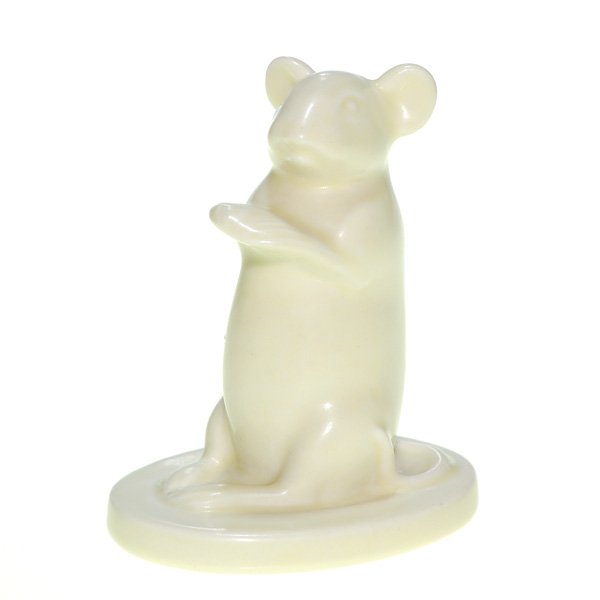 Rookwood 3 1/2” Mouse paperweight, #6618, 1937: Mouse paperweight, designed by Shirayamadani and patterned after a little guy who shared crumbs from the Master’s lunch, cast in 1937 and covered with the Ivory Mat glaze. Impressed with the Rookwoo