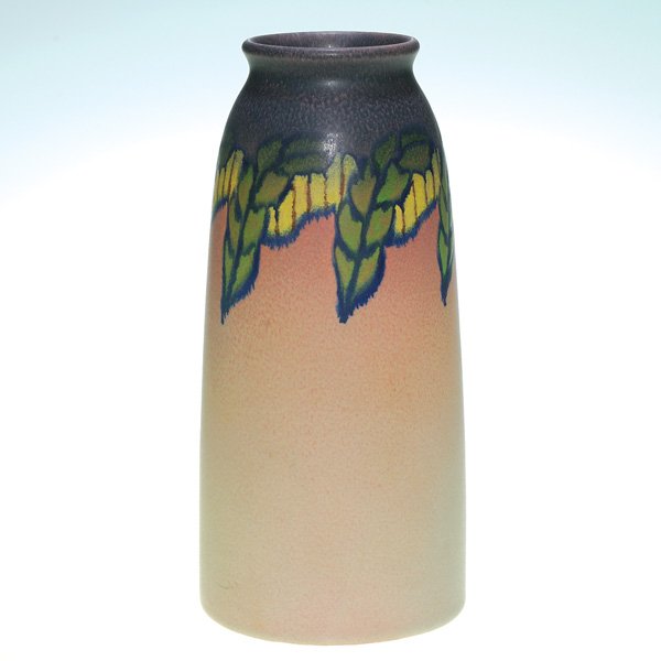 Rookwood decorated mat, 10 1/4” vase, 1920, Todd: Decorated mat glaze vase with a repeating floral pattern encircling the upper portion of the vessel, the work of Charles S. Todd in 1920. Impressed with the Rookwood symbol, the date, shape 1658 D and
