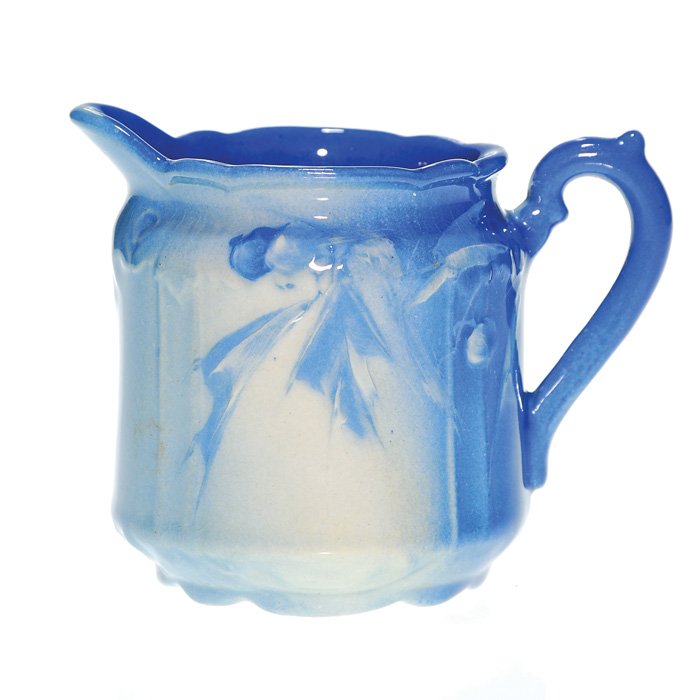 Roseville Azurean 3 1/2” pitcher, floral & berry: Roseville Azurean 3 1/2 inch pitcher decorated with a flower and berry design, perhaps by Claude Leffler. Impressed on bottom RPCo 937 F 1 and bearing an artist monogram to the right of the handle whi