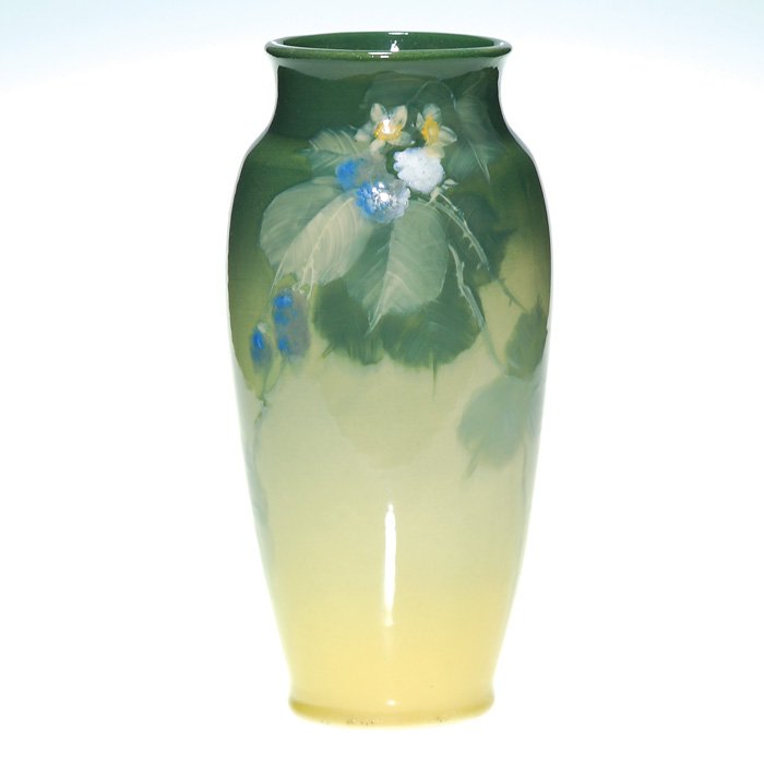 Roseville Rozane Light 12 1/4” vase, Mitchell: Roseville Rozane Royal Light vase decorated by Lillie Mitchell, who arranged blackberry vines on the vase. Marked with the raised Rozane Ware wafer seal, which has been partially effaced, indicating a