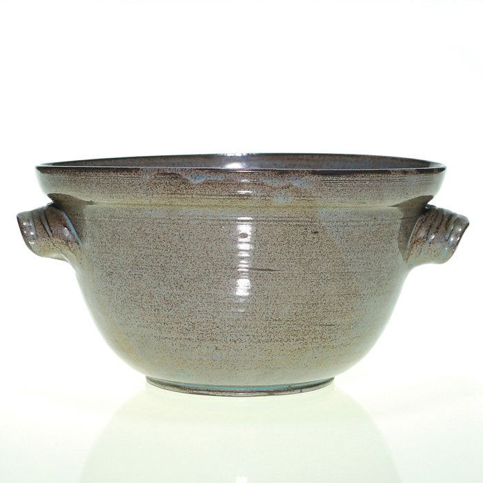 Scheier bowl, gray, blue, brown, 4 1/2” X 9 1/4”: Scheier bowl with lug handles glazed in gray, blue and brown by Ed and Mary Scheier. Incised “Scheier” on bottom. There is a very small nick to the base which has been glazed over. Size is 4 1/2 i