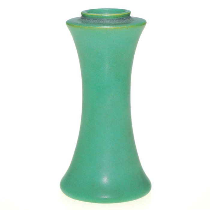Teco 6 1/2” vase, green mat: Teco vase covered with their signature mat green glaze with some charcoaling at the top. Impressed twice with the Teco logo. In excellent, original condition. Height is 6 1/2 inches.