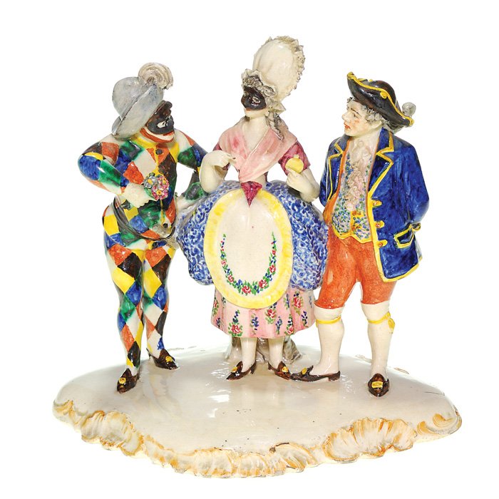 Early French 6 1/2” X 7” figural, Masked Ball: Early French figural depicting three attendees at a Masquerade Ball, one dressed as a harlequin, a woman dressed a la Marie Antoinette and the third as an American colonial. Marked only with an asteri