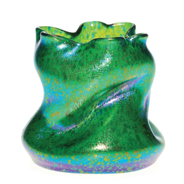 Loetz Papillon vase, twisted, clover rim, 4 3/4": Loetz creta Papillon vase with a half twist body and free form clover leaf rim. Attribution to Jutta Sika, a designer of vases with distorted bodies. Height 4 3/4 inches. Nice rainbow iridescence on t