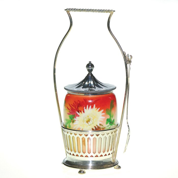 Pairpoint pickle castor, opal, Mums,10 1/2": Pairpoint pickle castor, having a 4 1/2 inch opalware container nicely decorated with white and ruby “mums” front and back against a colorful backdrop. The 10 1/2 inch holder is impressed “Pairp