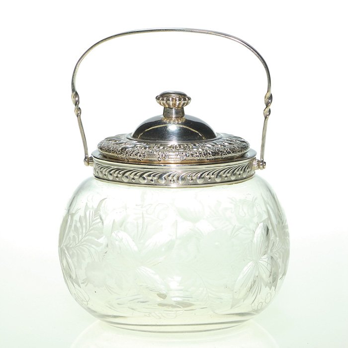 Pairpoint crystal marmalade, wheel carved, 5": Pairpoint crystal “orange size” marmalade, the surface wheel carved with a wreath of flowers and leaves. The decorative cover embossed with tiny flowers and bearing the “P” in diamond logo and