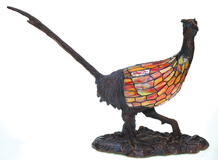 Schneider bronze “Pheasant” leaded lamp, 16 1/2”: Seldom seen Charles Schneider bronze “Pheasant” leaded lamp. This noble fellow has a nice segmented glass body of yellow, amber and ruby red and having well defined long tail feathers, a handsome 