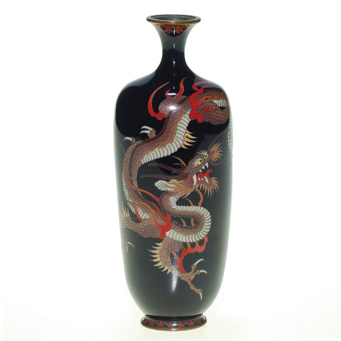 Japanese Cloisonnè dragon vase, artist signed: Japanese Cloisonne vase, a serpentine dragon gracing one side and a design on the rim and base. Height 6 inches. Artist mark on the bottom. Excellent condition.
