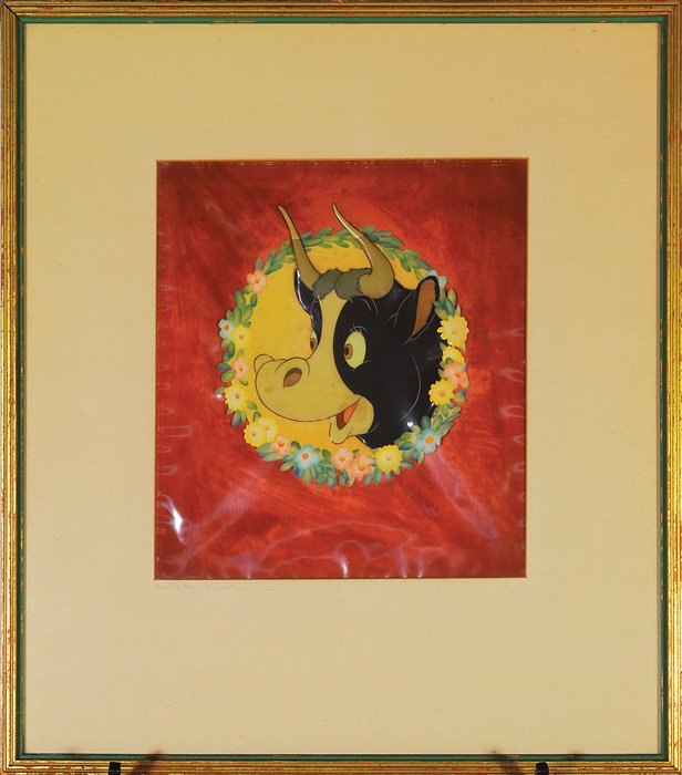 Original Disney cell from “The Story of Ferdinand: Walt Disney Studios original animation color celluloid from the 1938 production of “Ferdinand The Bull”. The cell displays the portraiture of the cheerful and good natured bull peering from a flor