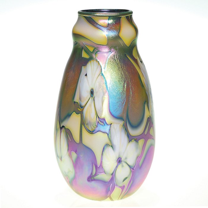 C. Lotton vase, Multi Flora, white, 9 7/8”, ‘92: Handsome Charles Lotton Multi Flora vase created in 1992. The yellow opal white body is caressed with white dogwood-like flowerheads knitted between blue aurene leaves and vines with magenta highlight