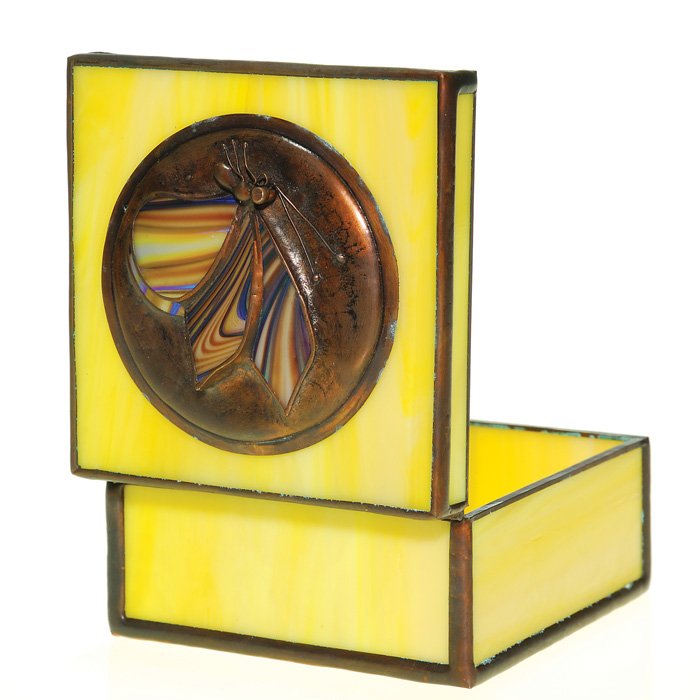 Orient & Flume “butterfly” box,Daniel Boone design: Orient & Flume lead, copper and yellow glass box, a design by Daniel Boone placing a butterfly onto a copper medallion and attaching to the cover. Measures 2 3/8 inches by 4 inches square. Signed “D