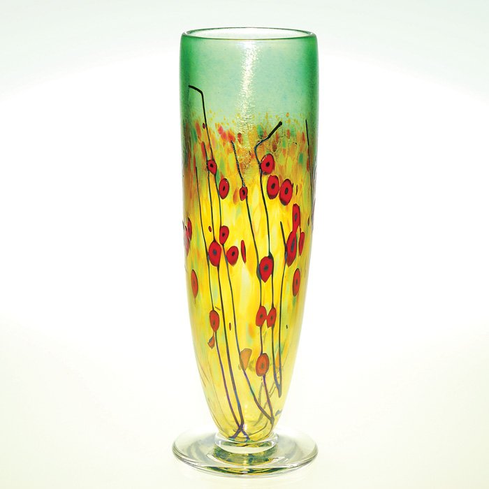 Robert Held vase, red milliefiori flowers, 12”: Robert Held vase impressed with a field of flowers in bright orange red attached to delicate black stems and set against a haze of distant amber red flowers and green. The 12 inch vase is engraved “