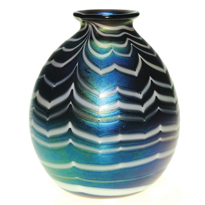 Early C. Lotton vase, waves, 7 3/4”, signed, 1972: Very early Charles Lotton vase imitating a dark blue planet with rings or maybe the ocean at night with waves capped in white. Either way the vase stands 8 inches, bears a 1972 date beside “Lotton��