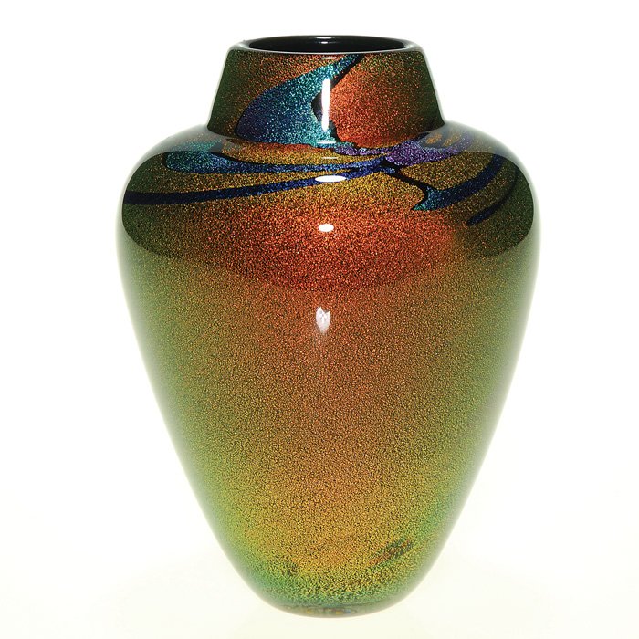 R. Strong vase, amber w/scarves, 6”, signed: Attractive Randy Strong vase, the shoulder artistically arranged with rhythmic pink, purple and aqua veils floating over a copper metallic backdrop. Height 6 inches. Engraved “R. Strong, ‘06” at