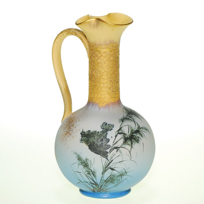 Rookwood Dull Finish 8 1/8” ewer, bird, MAD?,'86: Dull Finish ewer decorated with a single bird flying around some Asian grasses with lots of gold accenting, made in 1886 and attributed to the skilled hands of M.A. Daly. Impressed Rookwood in block l