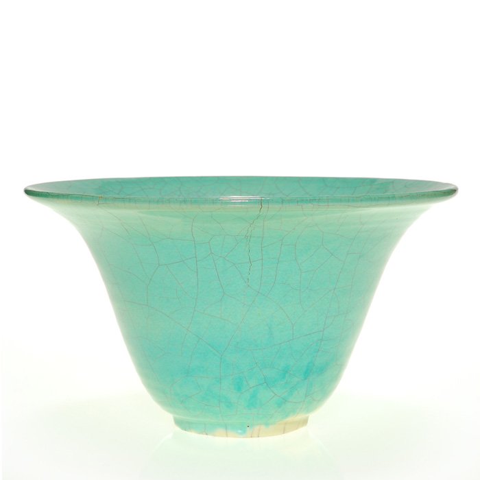 Glen Lukens turquoise bowl, 4 3/4" x 8 1/2”: Glen Lukens turquoise glazed ceramic bowl with crackle finish inside and out. Incised name of the artist. Measures 4 3/4 inches by 8 1/2 inches. Two lines extend from the rim, one almost full length o