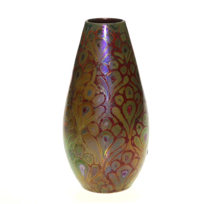 Clement Massier vase, peacock feather, 6 1/4”,marks: Clement Massier luster vase completely covered with peacock feathers. Height 6 1/4 inches. The bottom is impressed “CM” and painted “CM, Golfe-Juan AM”. On the side near the base are the initi