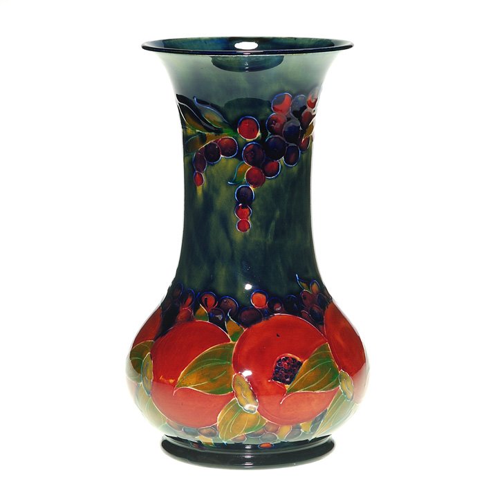 Moorcroft Pomegranate vase, Burslem, 9 1/2”: Moorcroft “Pomegranate” Burslem vase. Height 9 1/2 inches. Impressed “Moorcroft Burslem England, M37” and with the painted signature for William Moorcroft. Very minor glaze rub on foot rim. Go