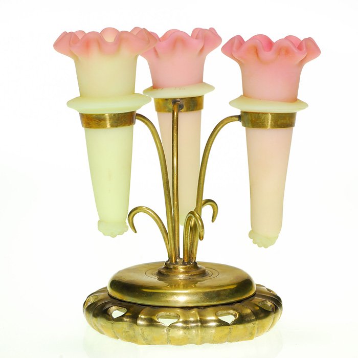 Mini Webb Burmese epergne, 3 posy holders, 3 1/8”: Charming Thomas Webb Burmese epergne having three flower holders resting within a tri-arm brass holder with a pierced base. The diminutive ruffled holders measure 3 1/8 inches and are tipped berry but