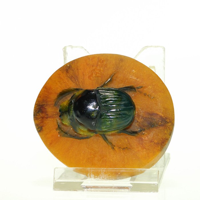 Almeric Walter pate-de-verre scarab paperweight, 1”: Good Almeric Walter pate-de-verre scarab paperweight. The dark blackish green beetle skitters over a chestnut brown ovalish plinth. Height 1 inches, diameter 2 1/8 inches. Mold monogram impressions of
