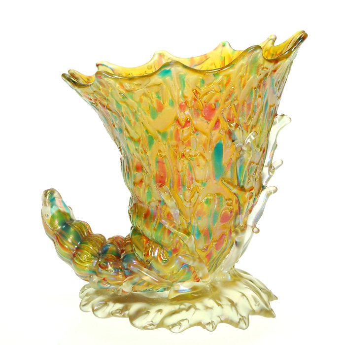 Loetz Mimosa cornucopia, teal, red & amber, 4 5/8” : Attractive Loetz cornucopia displaying the Mimosa pattern with a color collage of confetti threads mixed within the honey amber glass. The artist tugged the rim gently and placed some coral branches a