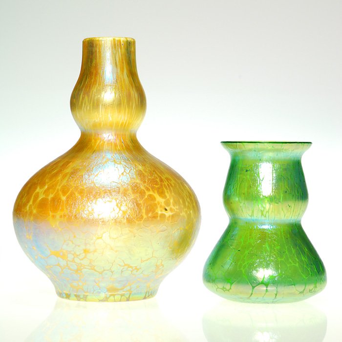 2 Loetz Papillion vases, mini 3 5/8” green; 6” gold: Two Loetz “Papillion” vases: First a cute and shapely miniature Creta green measuring 3 5/8 inches. Second a 6 inch Candia gold double gourd having polishing to the rim. Both reflect abundance of