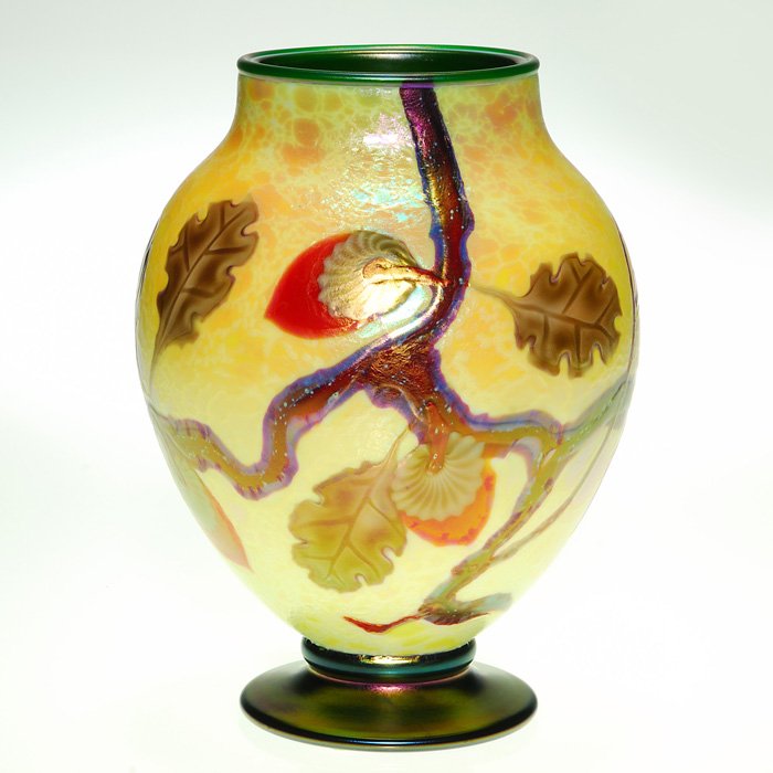 Ltd Ed Orient&Flume vase, Alexander/Smallhouse, 8: Limited Edition Orient & Flume vase decorated with a branch of oak leaves and acorns silhouetted over a textured sunny yellow backdrop. Enhanced with an emerald green casing and bronzy base. This beau