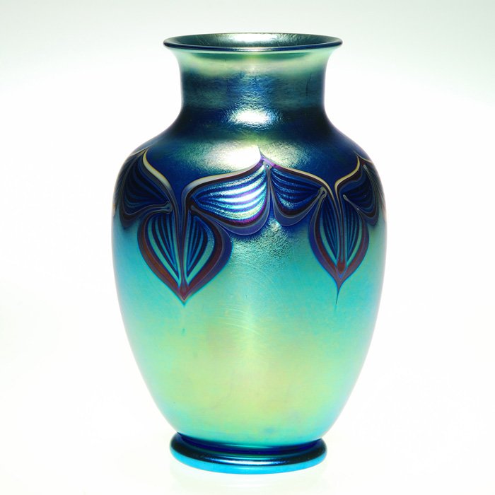 Early Orient & Flume “Iriscene” Vase, Feather, 7”, ‘78: Early Orient & Flume “Iriscene” vase in blue aurene, the shoulder decorated with an arrangement of pulled feathers in 1978. Height 7 inches. The company name and the creative date is inscribed bel
